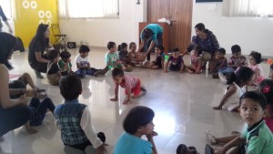kids playing together in an activity at Day care